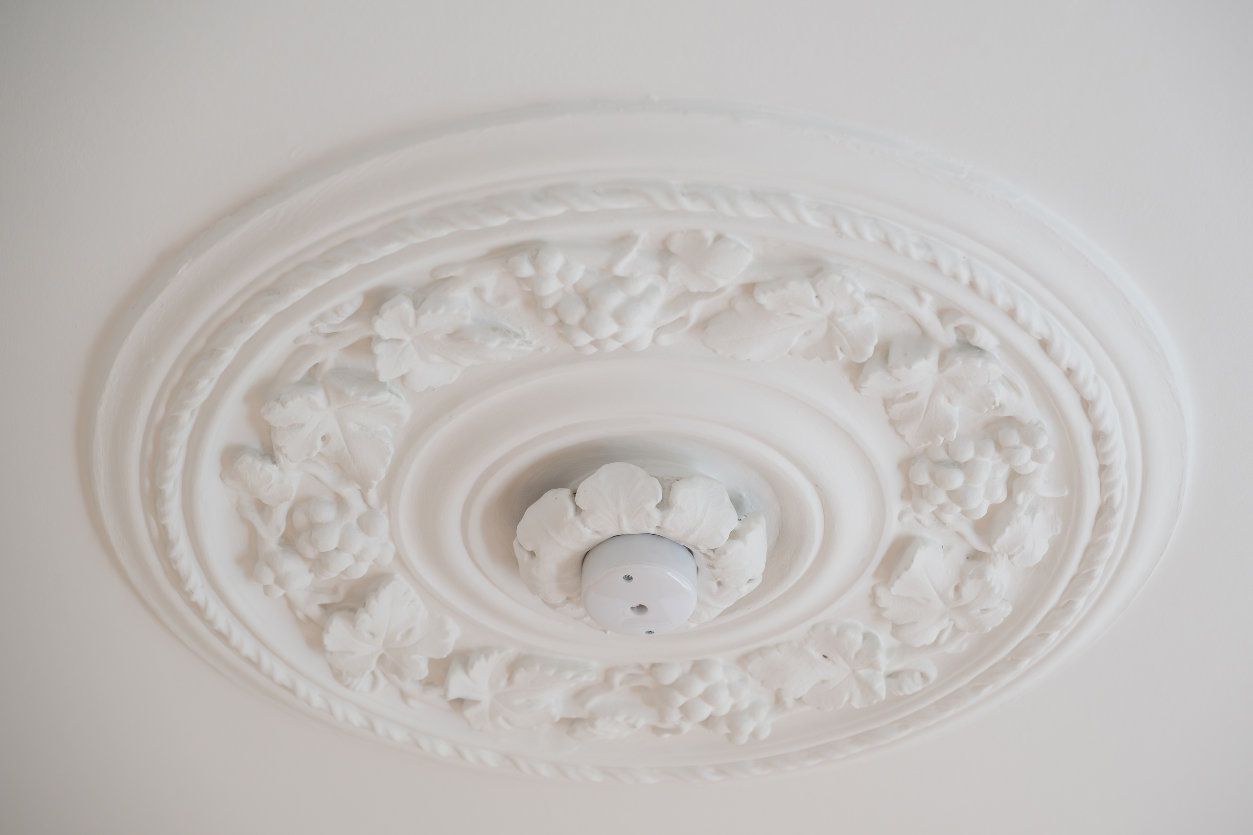 Detalje af ornamenteret loftsroset