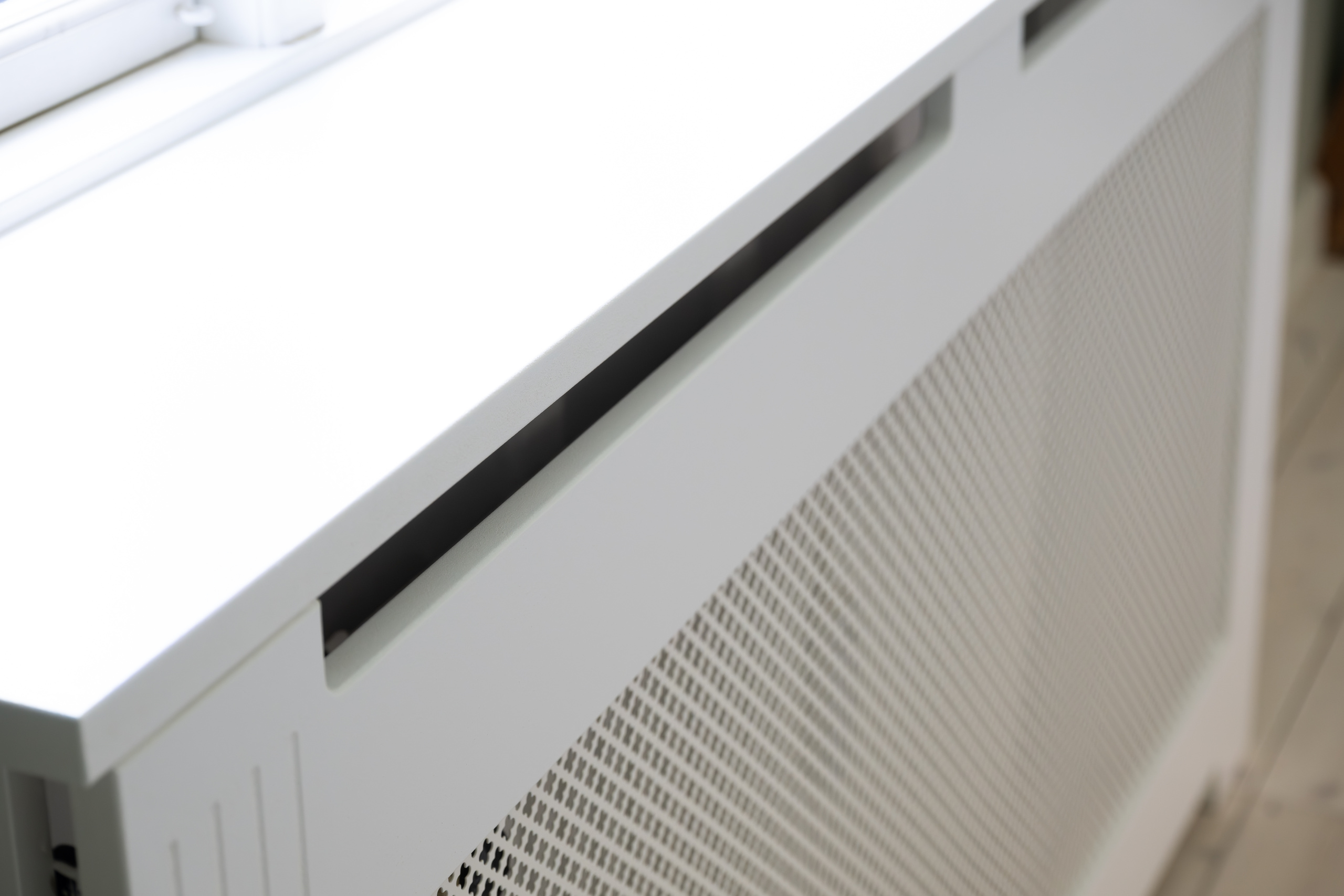 Detalje af radiatorinddækning